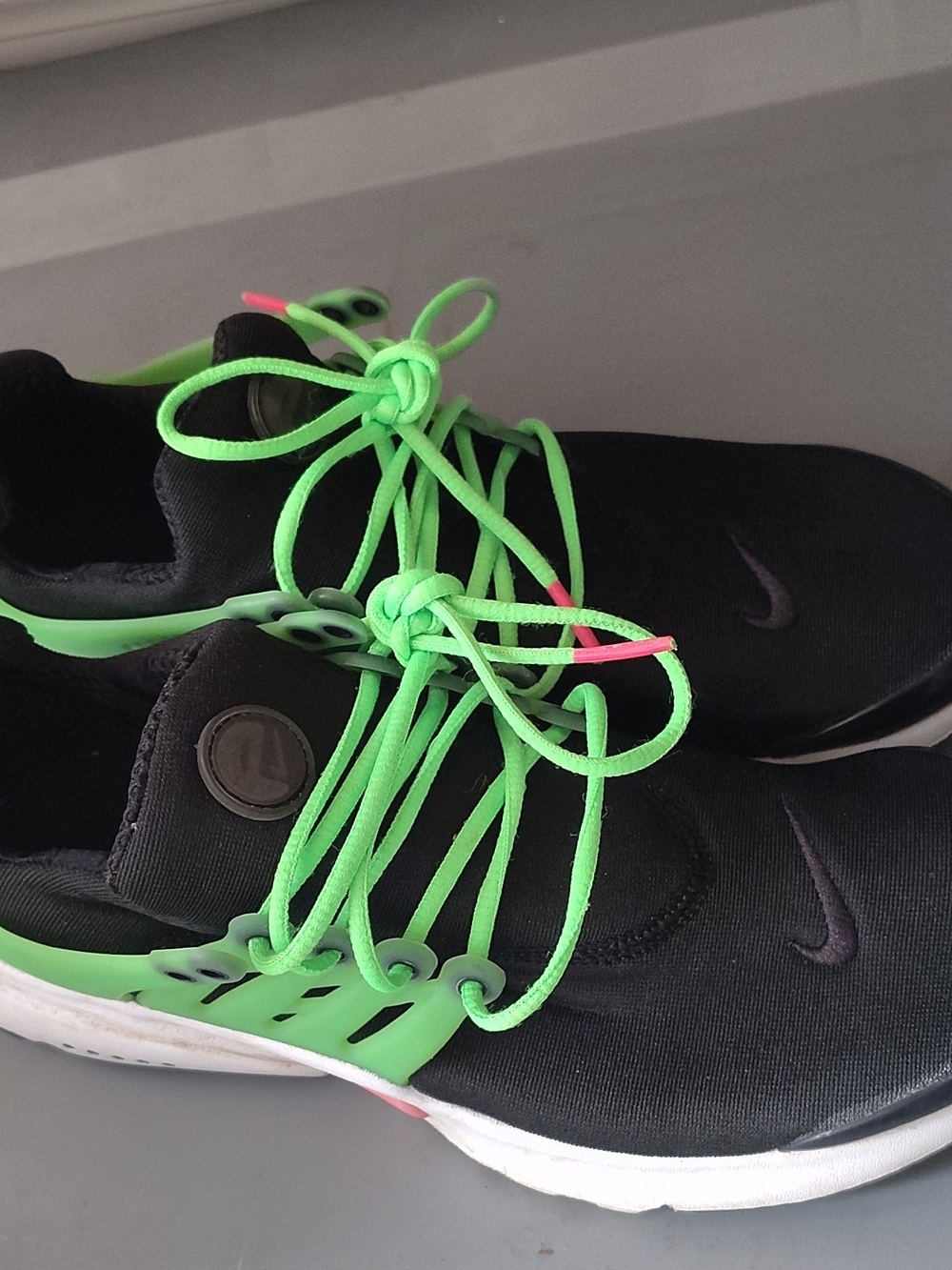 Nike Kids Black Sneakers with Neon Green Laces and Accents